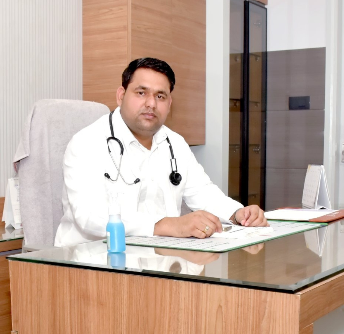 Dr Anuj